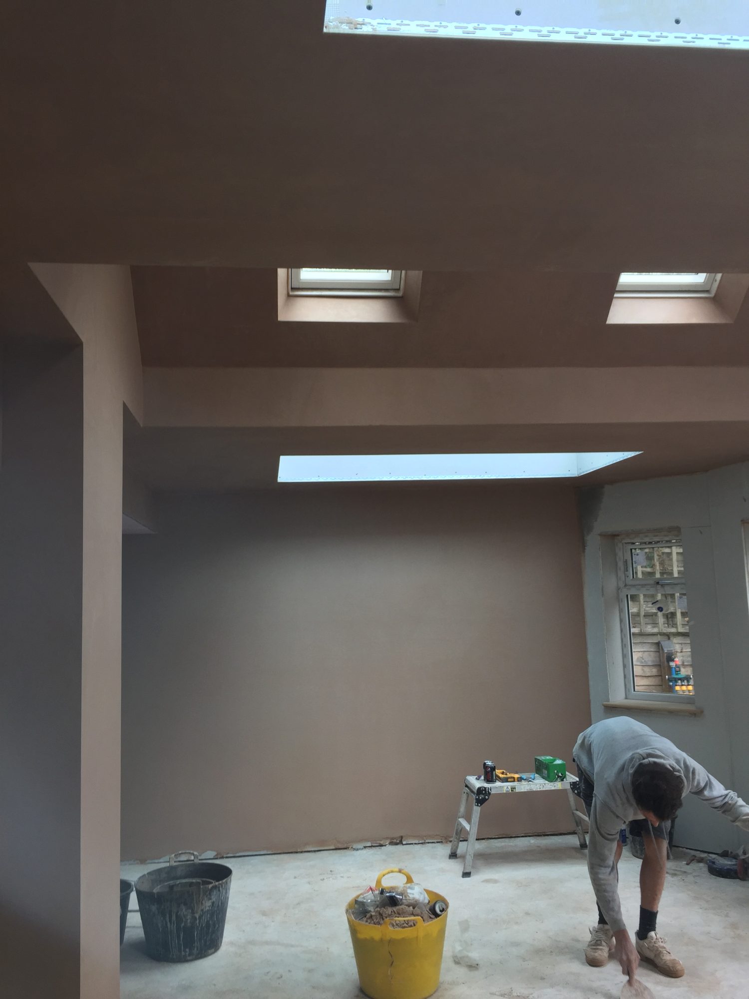 Plastering walls and ceilings