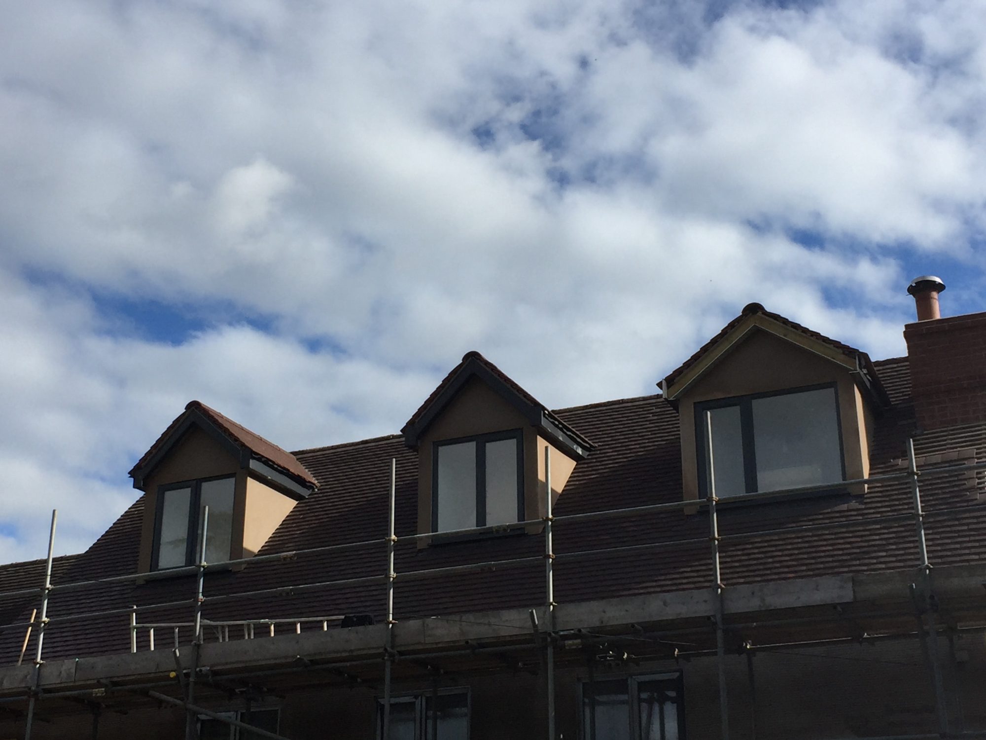 External rendering on dormer windows